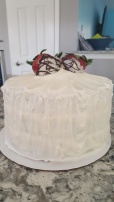 3-Layer Yellow Cake w/fresh strawberries between each luscious layer, frosted with a light dreamy cream cheese frosting